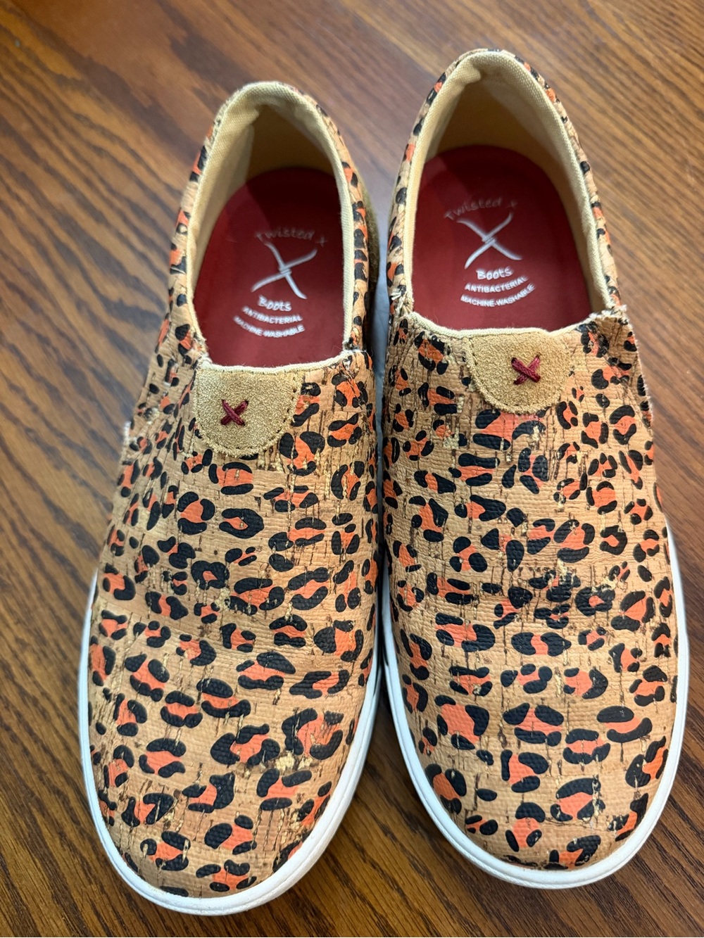 Twisted X Leopard Print Slip-On Flats in Orange and Black
